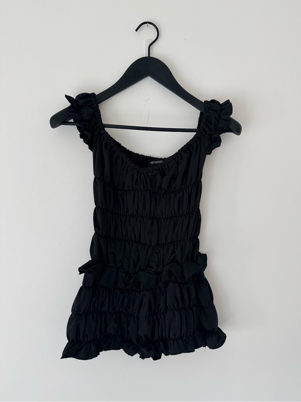 PrettyLittleThing Black Smocked Ruffle Romper